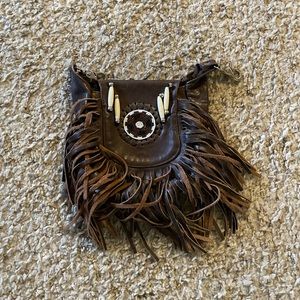 Fanny pack Fringe strapless fanny back you clip to belt hoops.